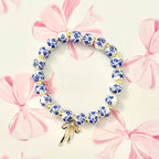 BOW CHARM FLORAL PORCELAIN BLUE BRACELET